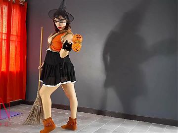 HALLOWEEN 2021 Witch in a sexy red suit pumpkins and a broom